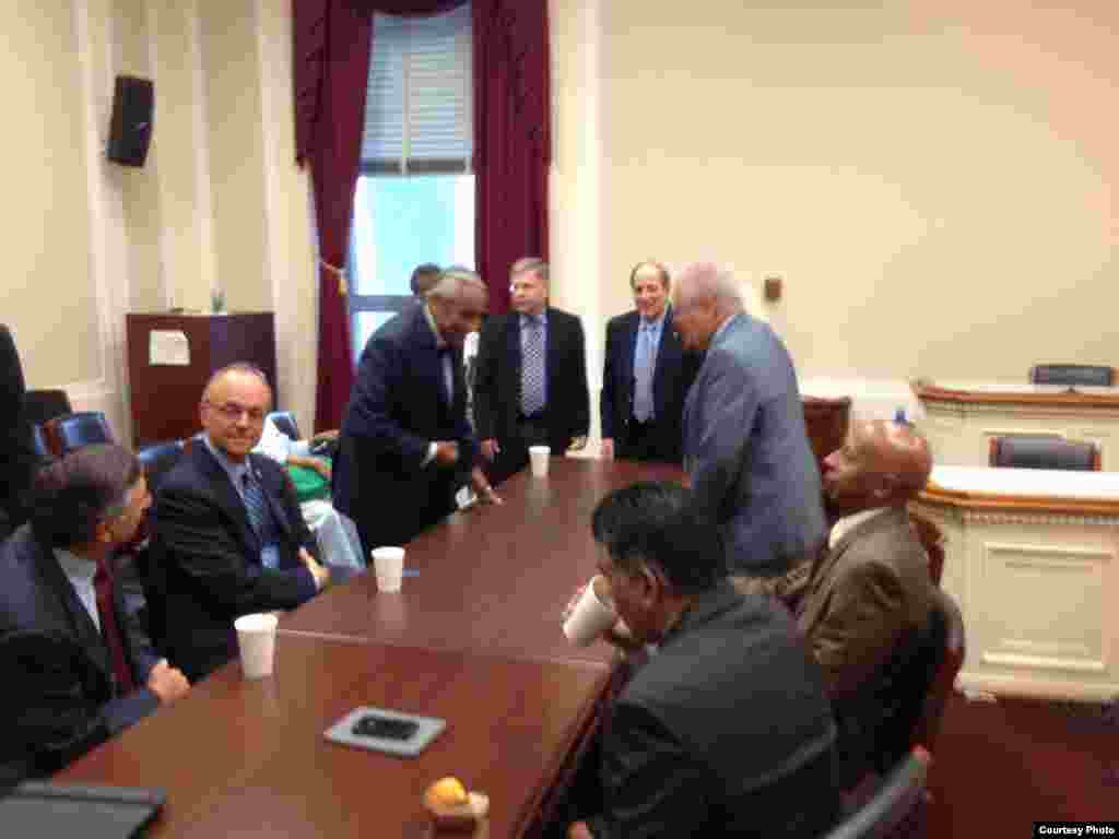 Guillermo Farinas y Elizardo Sánchez en la reunión con el congresista Charles Rangel